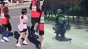 6岁女儿蹭跑全马引热议，父亲涉违规遭质疑